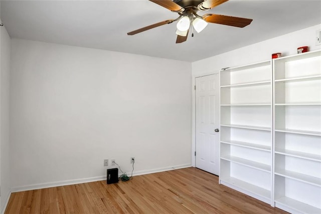 unfurnished bedroom featuring ceiling fan and light wood-type flooring