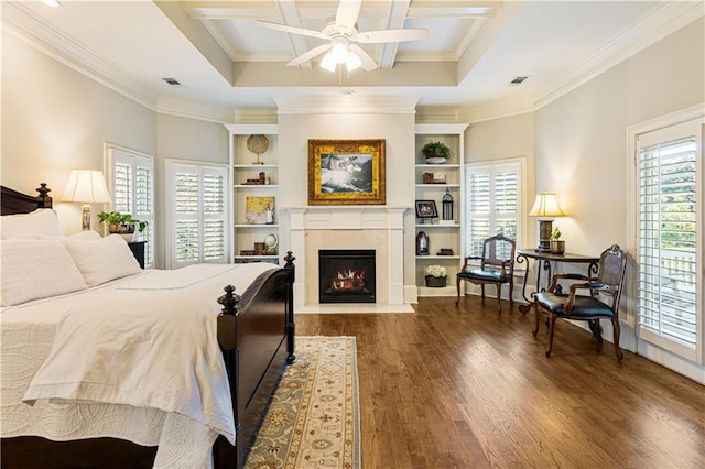 bedroom featuring ceiling fan, dark hardwood / wood-style floors, and ornamental molding