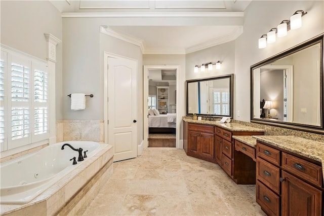 bathroom featuring vanity, ornamental molding, and tiled tub