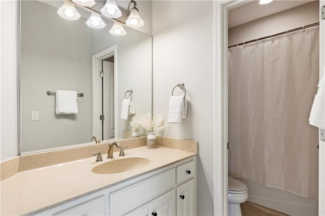 full bathroom with shower / bath combination with curtain, vanity, and toilet