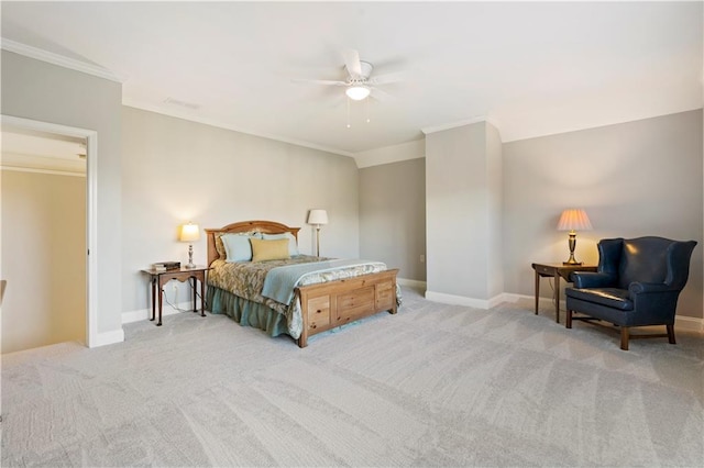 carpeted bedroom featuring ceiling fan and ornamental molding