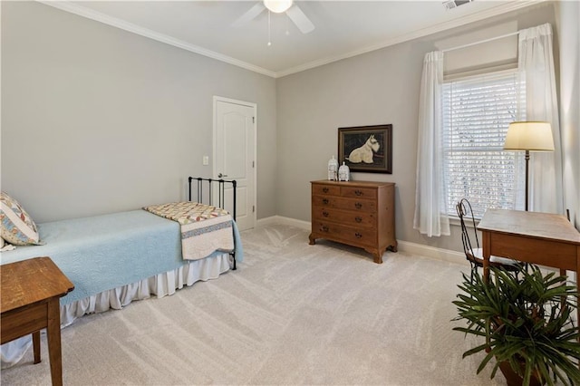 carpeted bedroom with multiple windows, ceiling fan, and ornamental molding