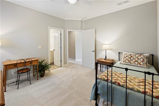 bedroom with light carpet, ensuite bathroom, ceiling fan, and crown molding