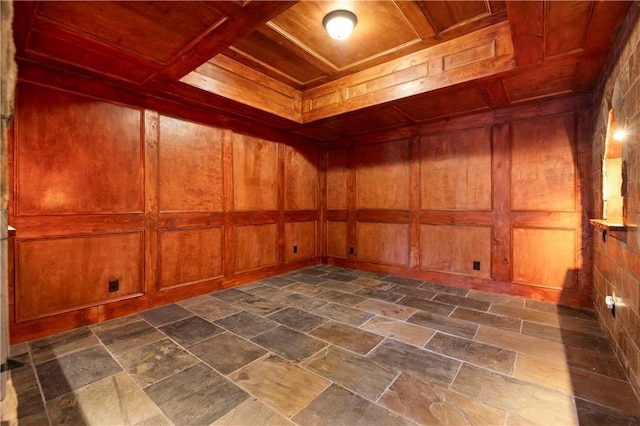 basement with wooden walls and wooden ceiling