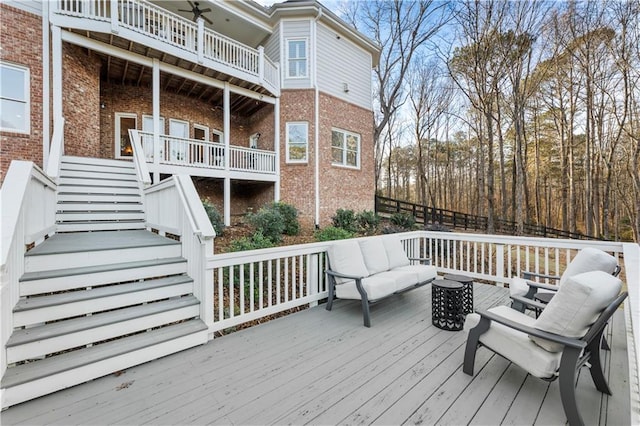 wooden deck with an outdoor hangout area