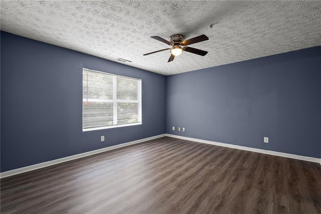 3303 Par Three Way, Lithonia, GA 30038 - unfurnished room with wood finished floors, a ceiling fan, and a textured ceiling