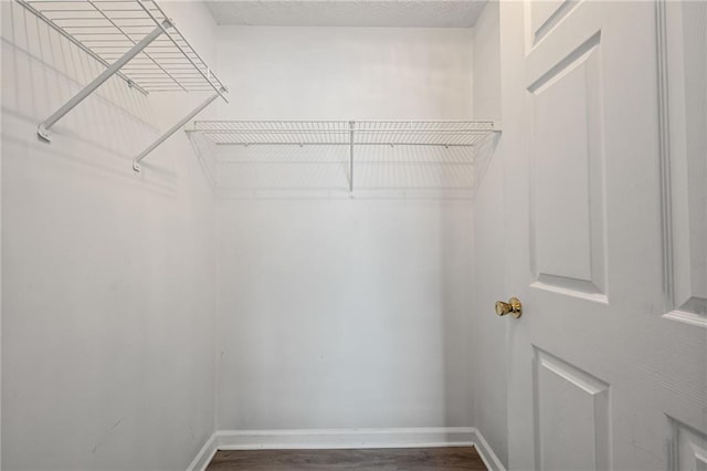 3303 Par Three Way, Lithonia, GA 30038 - walk in closet with dark wood finished floors