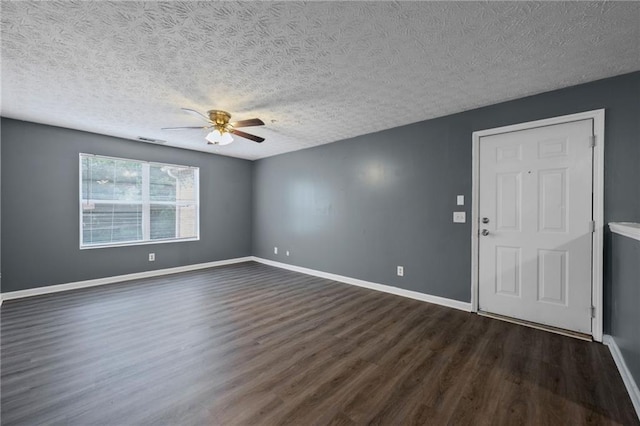 3303 Par Three Way, Lithonia, GA 30038 - unfurnished room featuring ceiling fan, dark wood-style flooring, and a textured ceiling