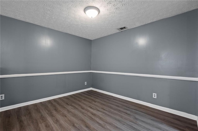3303 Par Three Way, Lithonia, GA 30038 - unfurnished room with wood finished floors and a textured ceiling