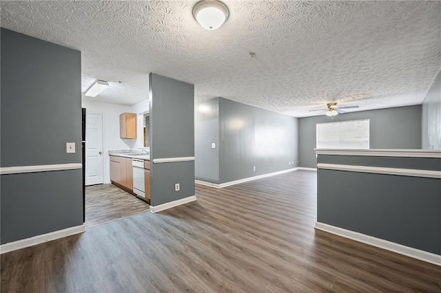 3303 Par Three Way, Lithonia, GA 30038 - unfurnished room featuring ceiling fan, dark wood-style floors, and a textured ceiling