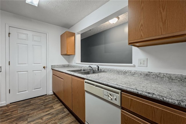 3303 Par Three Way, Lithonia, GA 30038 - kitchen featuring dishwasher, dark wood-style floors, light countertops, a textured ceiling, and brown cabinetry