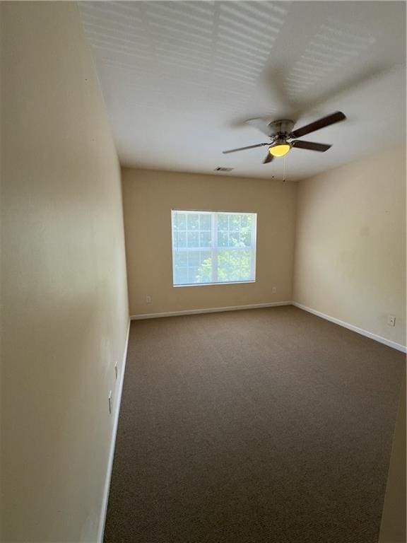 118 Pointe Cir, Dahlonega, GA 30533 - spare room featuring a ceiling fan and carpet flooring