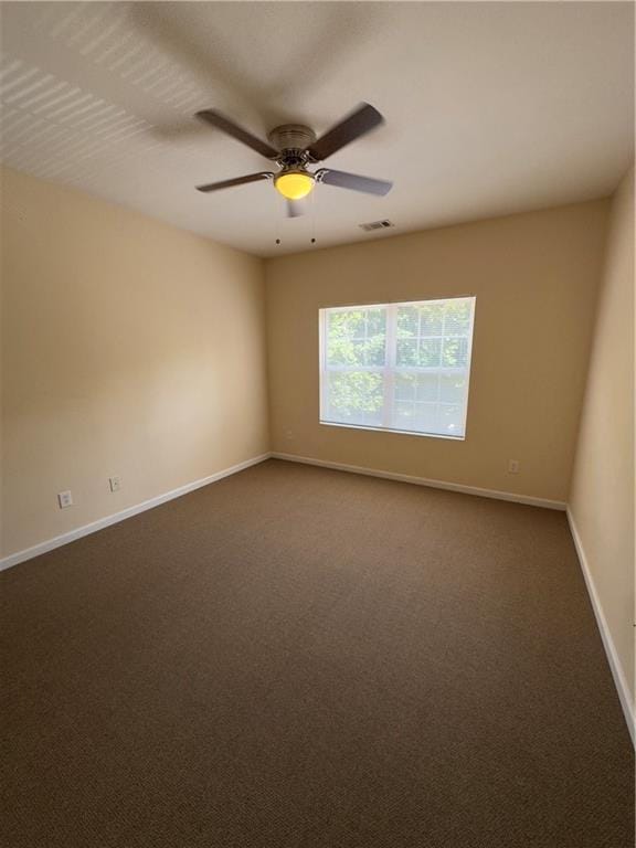 118 Pointe Cir, Dahlonega, GA 30533 - spare room featuring dark carpet and a ceiling fan