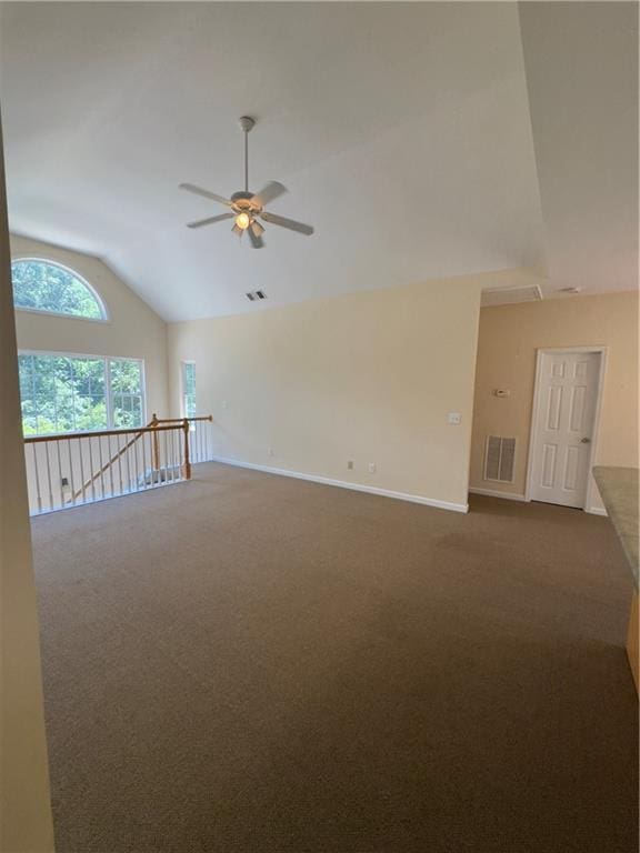 118 Pointe Cir, Dahlonega, GA 30533 - unfurnished room with vaulted ceiling, a ceiling fan, and dark carpet