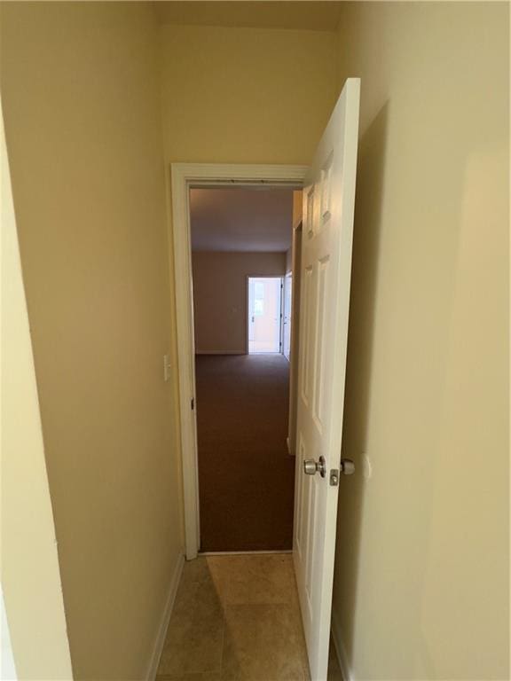 118 Pointe Cir, Dahlonega, GA 30533 - hallway with light tile patterned floors and baseboards