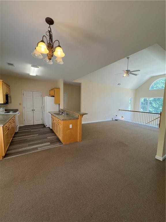 118 Pointe Cir, Dahlonega, GA 30533 - kitchen with white appliances, a chandelier, open floor plan, dark carpet, and lofted ceiling