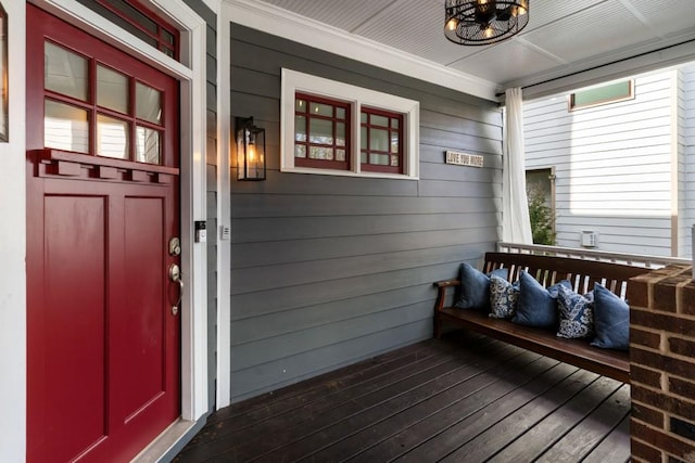 property entrance featuring a porch