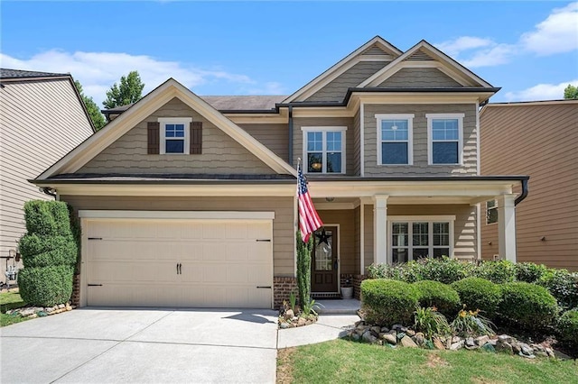 craftsman-style home with a garage and covered porch