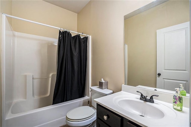 full bathroom featuring vanity, toilet, and shower / tub combo