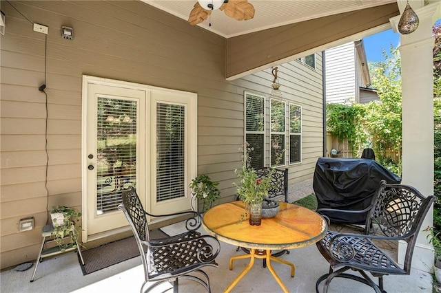 view of patio featuring area for grilling and ceiling fan