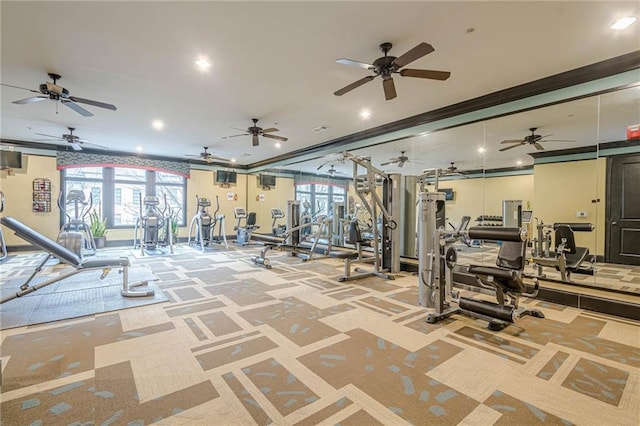 gym featuring crown molding and carpet floors