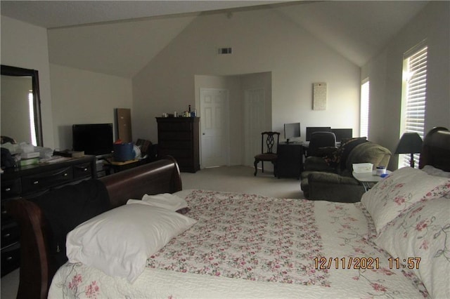 bedroom featuring carpet floors, high vaulted ceiling, visible vents, and beamed ceiling