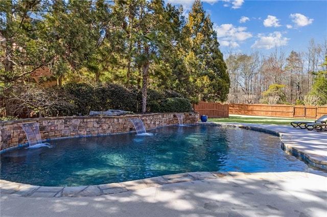 view of swimming pool with a fenced in pool, a fenced backyard, and a patio