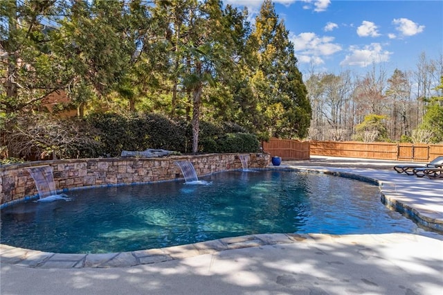 view of pool with a fenced in pool, a patio area, and a fenced backyard