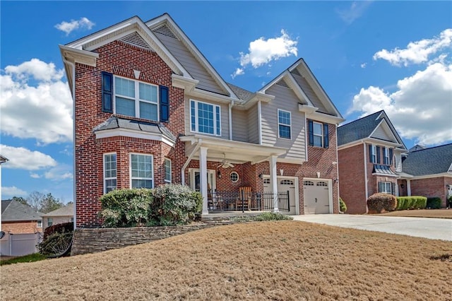 view of front of property with a front lawn, a porch, concrete driveway, a garage, and brick siding