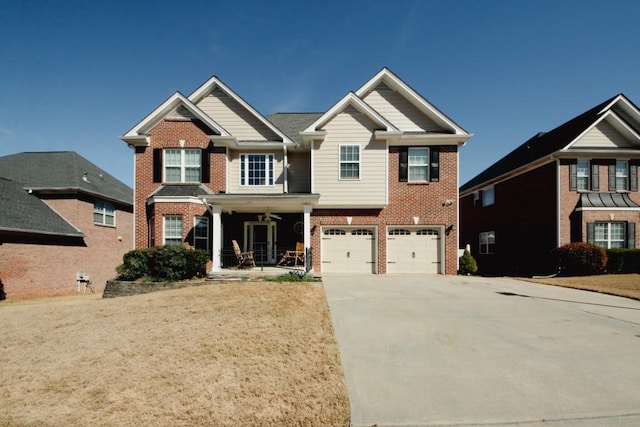 craftsman-style home featuring a porch, brick siding, driveway, and an attached garage