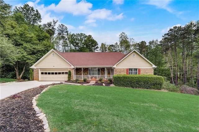 single story home featuring driveway, an attached garage, covered porch, a front yard, and brick siding