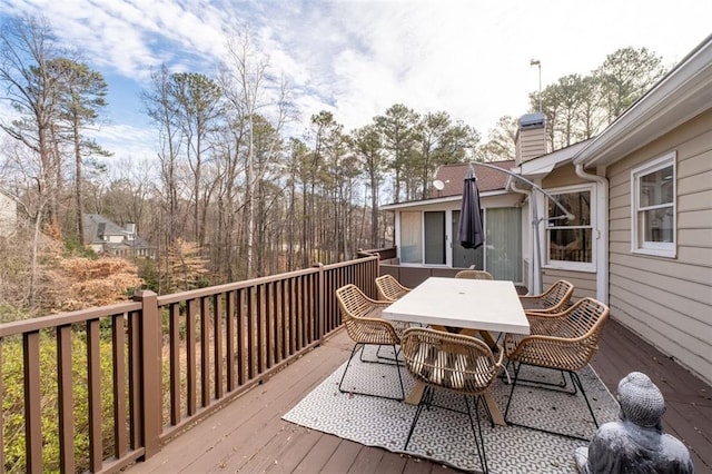 deck with outdoor dining space