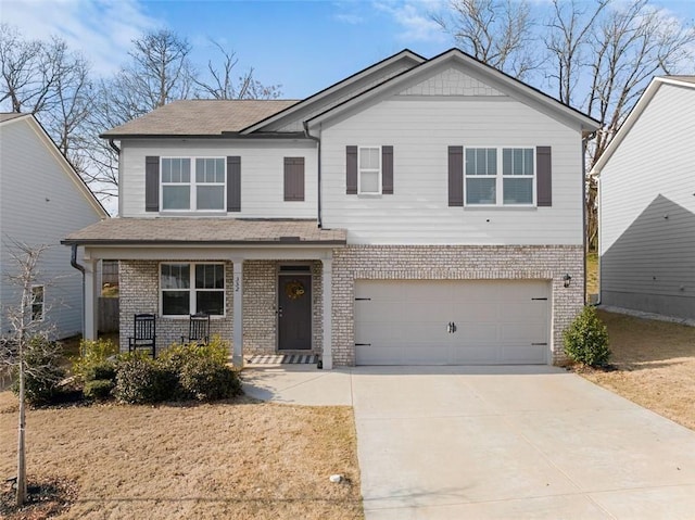 view of front of home with covered porch, brick siding, an attached garage, and concrete driveway