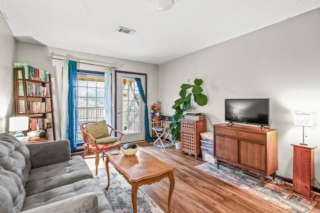 living room with hardwood / wood-style flooring