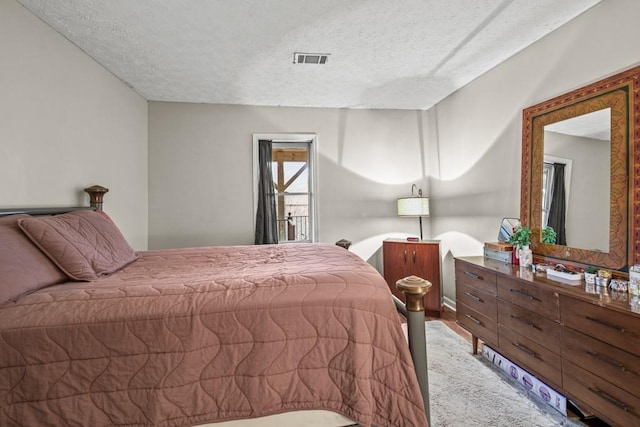 bedroom with a textured ceiling