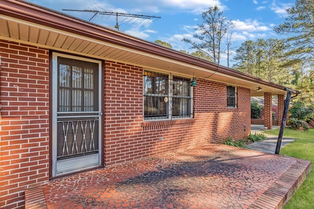 doorway to property featuring a patio