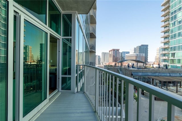 balcony featuring a city view