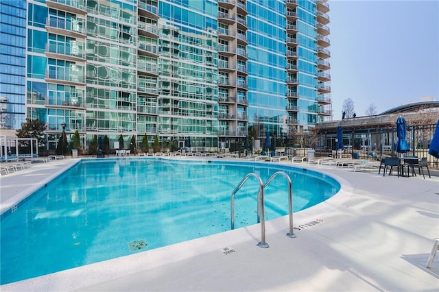 pool featuring a patio area