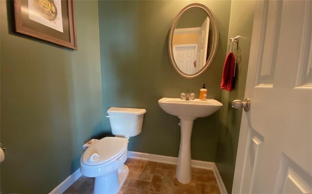 bathroom with toilet and sink