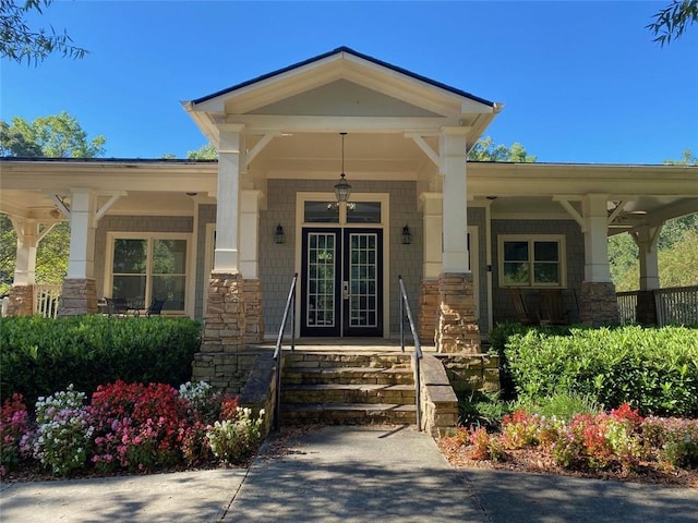 entrance to property with covered porch