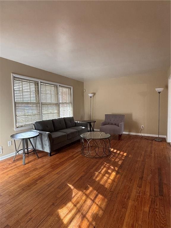 unfurnished living room with hardwood / wood-style floors