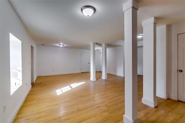 basement featuring light wood-type flooring