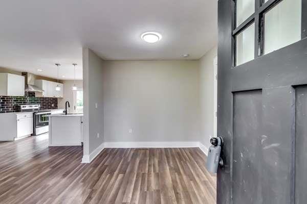 interior space with sink and dark hardwood / wood-style floors