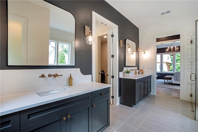 full bath featuring visible vents, tile patterned flooring, vanity, a shower stall, and ensuite bath