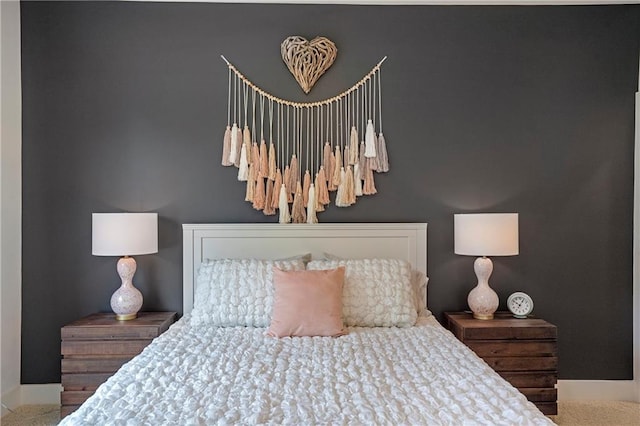 bedroom featuring baseboards