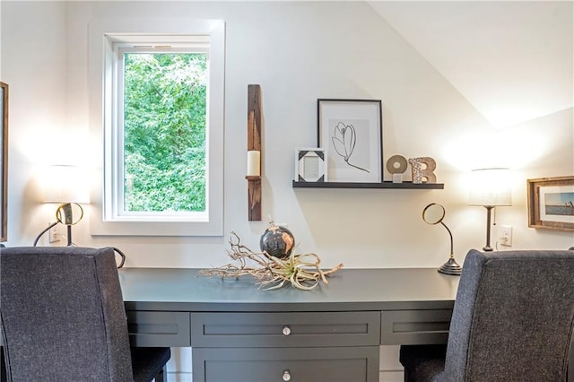 office area featuring vaulted ceiling
