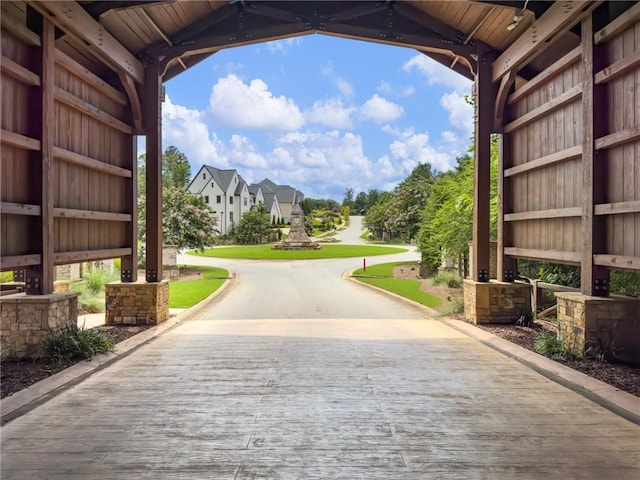 view of property's community with a lawn