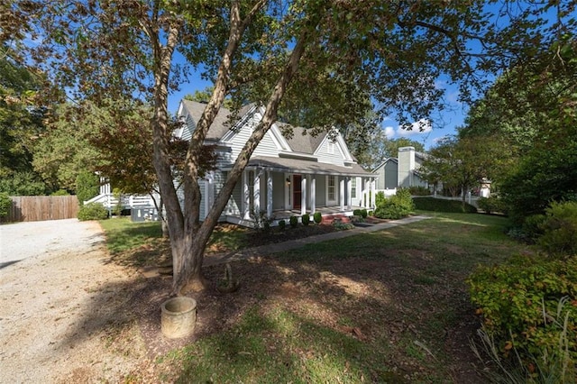 exterior space featuring a front yard and covered porch