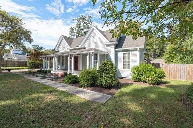 view of front facade featuring a front yard and a porch