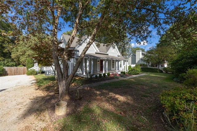 150 E Main St, Rutledge, GA 30663 - view of front of property with a porch, fence, and a shingled roof